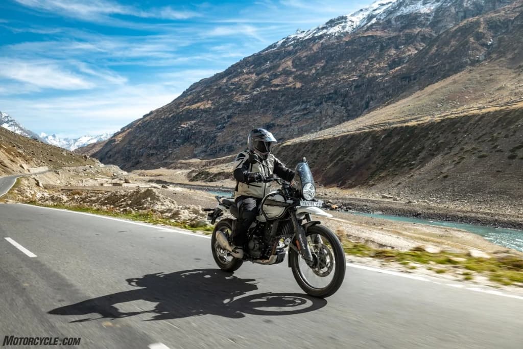 Royal Enfield Himalayan adventure motorcycle riding on mountain pass